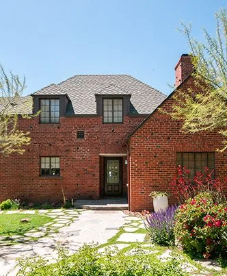 Old english style home exterior and garden remodel.